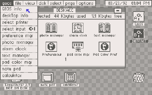Tiny GUI desktop with a big friendly lower case font. There’s a menu bar on the top left and a clock menu on the top right, but they’re separate menus, not together like the Mac. Everything is in black and white, except for the mouse cursor.